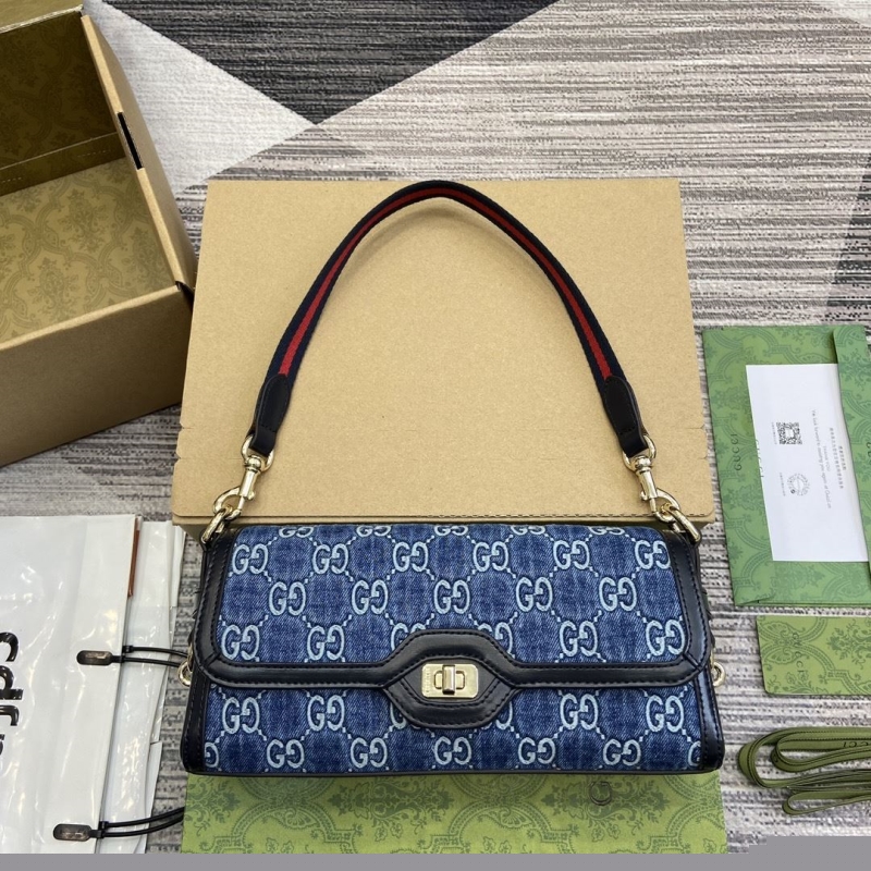 G*u*i top handle bags